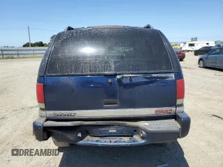 2001 GMC Jimmy SLE Rental Fleet z VIN 1GKDT13W212108144, wystawiony jako Copart lot #58753865 z przebiegiem 254 402 mil mil oraz Szkoda całkowita • Salvage title. Historia ofert i sprzedaży dostępna na DreamBid. Obrazek 6.