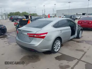 2015 Toyota Avalon Limited with VIN 4T1BK1EB2FU149980, listed as a IAAI auction lot 41897411 with 136,507 mi miles and . Bid and sale history available at DreamBid. Image 4.
