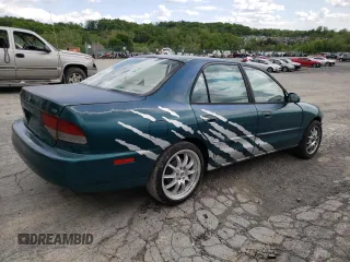 1997 Mitsubishi Galant ES z VIN 4A3AJ56G5VE019296, wystawiony jako Copart lot #56047635 z przebiegiem 87 533 mil mil oraz Szkoda całkowita • Salvage title. Historia ofert i sprzedaży dostępna na DreamBid. Obrazek 3.