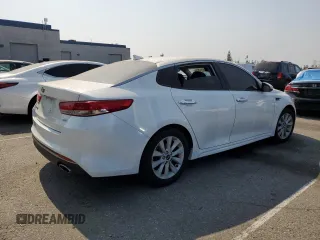 2016 Kia Optima EX with VIN 5XXGU4L32GG086761, listed as a Copart auction lot 64317125 with 145,967 mi miles and Salvage title. Bid and sale history available at DreamBid. Image 3.