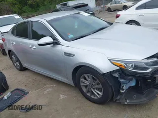 2020 Kia Optima LX with VIN 5XXGT4L38LG381098, listed as a IAAI auction lot 42202500 with 94,239 mi miles and . Bid and sale history available at DreamBid. Image 1.