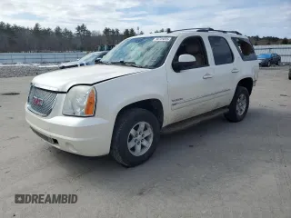2012 GMC Yukon SLT with VIN 1GKS2CE05CR242879, listed as a Copart auction lot 50725855 with 162,506 mi miles and Salvage Title. Bid and sale history available at carsss.com. Image 1.