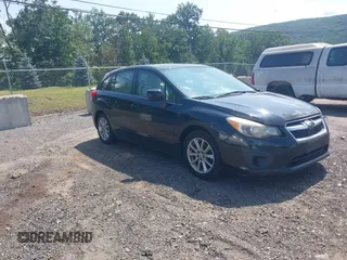 2012 Subaru Impreza Premium with VIN JF1GPAC66CH226572, listed as a IAAI auction lot 42815250 with 160,116 mi miles and . Bid and sale history available at DreamBid. Image 1.