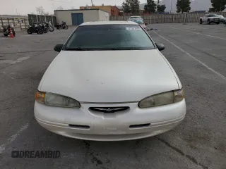 1997 Ford Thunderbird LX with VIN 1FALP62W5VH124101, listed as a Copart auction lot 47547695 with 148,828 mi miles and Salvage Title. Bid and sale history available at carsss.com. Image 5.