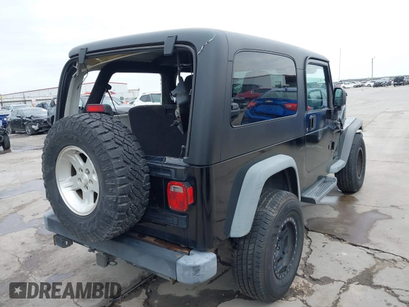 2004 Jeep Wrangler Sport with VIN 1J4FA49S64P794559, listed as a IAAI auction lot 41644201 with 107,445 mi miles. Bid and sale history available at carsss.com. Image 4.