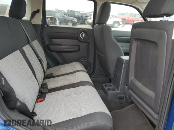 2009 Dodge Nitro SE with VIN 1D8GT28KX9W533248, listed as a Copart auction lot 70500994 with 124,091 mi miles and Salvage Title. Bid and sale history available at DreamBid. Image 11.