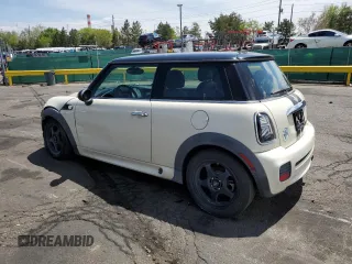 2013 MINI Hardtop with VIN WMWSU3C58DT373021, listed as a Copart auction lot 52945845 with 83,865 mi miles and Salvage Title. Bid and sale history available at DreamBid. Image 2.