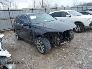 2015 BMW X5 sDrive35i with VIN 5UXKR2C54F0H35091, listed as a IAAI auction lot 41621452 with 92,919 mi miles. Bid and sale history available at carsss.com. Image 1.