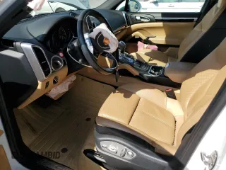 2016 Porsche Cayenne with VIN WP1AA2A20GLA00567, listed as a Copart auction lot 55452685 with Not provided miles and Salvage title. Bid and sale history available at DreamBid. Image 7.