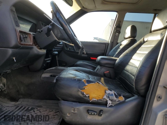 1998 Jeep Grand Cherokee with VIN 1J4FX48S4WC345469, listed as a Copart auction lot 80721224 with 201,543 mi miles and Salvage title. Bid and sale history available at DreamBid. Image 7.