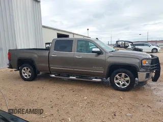 2015 GMC Sierra 1500 SLT with VIN 3GTU2VEC9FG173158, listed as a IAAI auction lot 41934631 with 207,226 mi miles and . Bid and sale history available at DreamBid. Image 13.