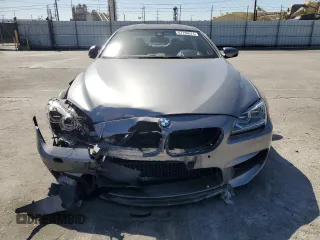 2015 BMW M6 z VIN WBS6C9C56FD467608, wystawiony jako Copart lot #67796074 z przebiegiem 67 706 mil mil oraz Szkoda całkowita • Salvage title. Historia ofert i sprzedaży dostępna na DreamBid. Obrazek 5.