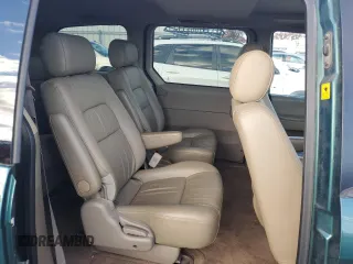 2002 Kia Sedona LX with VIN KNDUP131426217512, listed as a Copart auction lot 80928774 with 163,176 mi miles and Salvage Title. Bid and sale history available at carsss.com. Image 11.