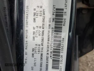 2012 Mazda 3 i Touring z VIN JM1BL1V71C1539849, wystawiony jako Copart lot #54977715 z przebiegiem 171 917 mil mil oraz Szkoda całkowita • Salvage title. Historia ofert i sprzedaży dostępna na DreamBid. Obrazek 13.