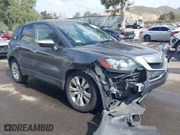 2012 Acura RDX Tech Pkg with VIN 5J8TB2H58CA002131, listed as a IAAI auction lot 41880892 with 140,115 mi miles. Bid and sale history available at carsss.com. Image 1.