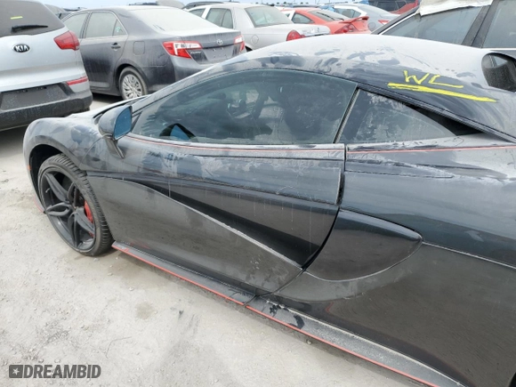2017 McLaren 570S with VIN SBM13DAAXHW003255, listed as a Copart auction lot 76261244 with 0 mi miles and Salvage Title. Bid and sale history available at carsss.com. Image 12.