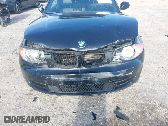 2011 BMW 1 Series 128i with VIN WBAUL7C54BVM80474, listed as a IAAI auction lot 42031032 with 76,617 mi miles and . Bid and sale history available at carsss.com. Image 6.