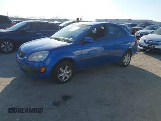 2008 Kia Rio LX with VIN KNADE123X86356526, listed as a IAAI auction lot 41649783 with 201,934 mi miles. Bid and sale history available at carsss.com. Image 2.