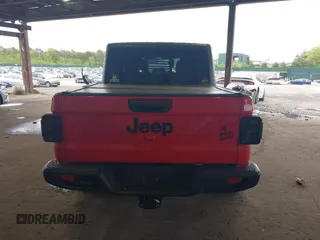 2021 Jeep Gladiator Willys z VIN 1C6HJTAG7ML602130, wystawiony jako IAAI lot #42161745 z przebiegiem 49 576 mil mil oraz . Historia ofert i sprzedaży dostępna na DreamBid. Obrazek 17.