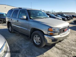 2001 GMC Yukon SLT z VIN 1GKEC13T71J223368, wystawiony jako Copart lot #86610954 z przebiegiem 414 811 mil mil oraz Szkoda całkowita • Salvage title. Historia ofert i sprzedaży dostępna na DreamBid. Obrazek 4.