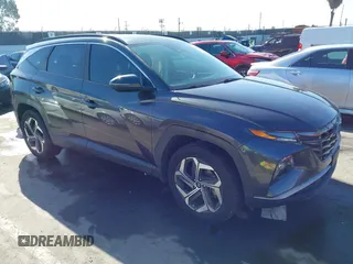 2022 Hyundai Tucson SEL with VIN 5NMJCCAEXNH061242, listed as a IAAI auction lot 41866145 with 63,501 mi miles and . Bid and sale history available at carsss.com. Image 1.