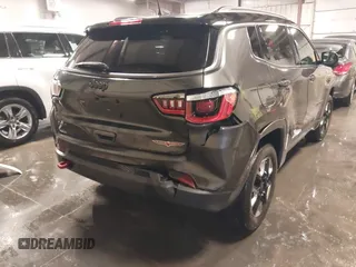 2018 Jeep Compass Trailhawk with VIN 3C4NJDDB4JT210451, listed as a IAAI auction lot 41239258 with 90,552 mi miles and . Bid and sale history available at carsss.com. Image 6.