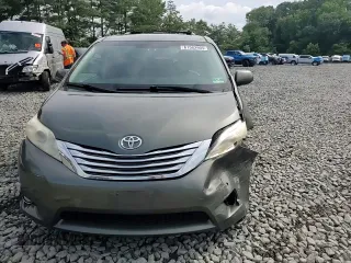 2011 Toyota Sienna XLE AAS with VIN 5TDYK3DC5BS094699, listed as a Copart auction lot 61583905 with 245,035 mi miles and Salvage title. Bid and sale history available at DreamBid. Image 14.