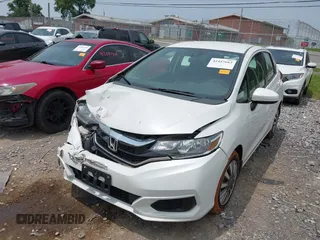 2019 Honda Fit LX with VIN 3HGGK5H41KM728618, listed as a IAAI auction lot 42457662 with 83,851 mi miles and . Bid and sale history available at DreamBid. Image 2.
