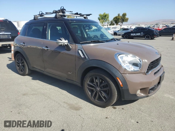2013 MINI Countryman S ALL4 z VIN WMWZC5C51DWP30390, wystawiony jako Copart lot #59869105 z przebiegiem 111 843 mil mil oraz Szkoda całkowita • Salvage title. Historia ofert i sprzedaży dostępna na DreamBid. Obrazek 4.