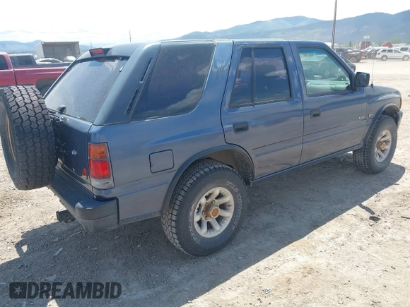 1995 Isuzu Rodeo z VIN 4S2CM58V5S4370553, wystawiony jako IAAI lot #42369256 z przebiegiem 198 946 mil mil oraz . Historia ofert i sprzedaży dostępna na DreamBid. Obrazek 4.