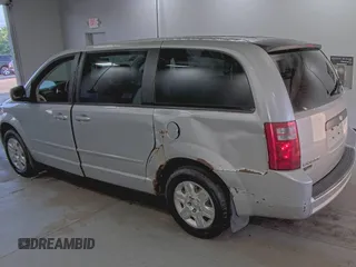 2010 Dodge Grand Caravan SE z VIN 2D4RN4DEXAR412152, wystawiony jako IAAI lot #42825395 z przebiegiem 93 398 mil mil oraz . Historia ofert i sprzedaży dostępna na DreamBid. Obrazek 9.