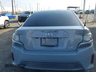 2014 Scion tC with VIN JTKJF5C7XE3079765, listed as a IAAI auction lot 41210220 with 114,410 mi miles. Bid and sale history available at carsss.com. Image 16.