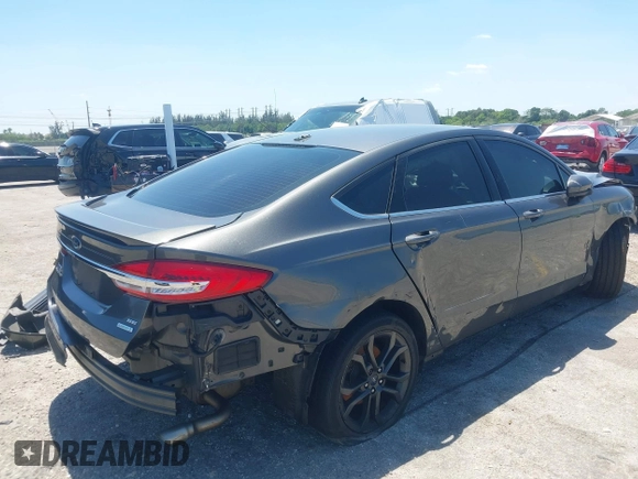 2018 Ford Fusion SE with VIN 3FA6P0HD6JR255644, listed as a IAAI auction lot 42021447 with 122,022 mi miles. Bid and sale history available at carsss.com. Image 4.