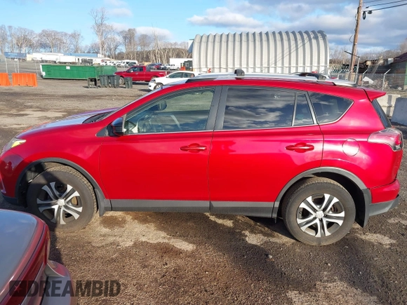 2016 Toyota RAV4 LE with VIN JTMBFREVXGJ100692, listed as a IAAI auction lot 41847333 with 130,822 mi miles. Bid and sale history available at carsss.com. Image 14.
