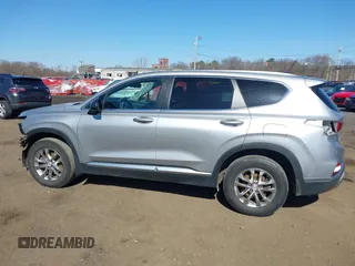 2020 Hyundai Santa Fe SE z VIN 5NMS2CAD7LH269302, wystawiony jako IAAI lot #41833303 z przebiegiem 70 665 mil mil oraz . Historia ofert i sprzedaży dostępna na DreamBid. Obrazek 14.