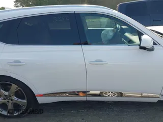 2022 Genesis GV80 with VIN KMUHCESC6NU084725, listed as a IAAI auction lot 42423446 with 66,562 mi miles and . Bid and sale history available at DreamBid. Image 14.