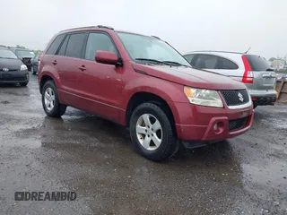 2006 Suzuki Grand Vitara Premium z VIN JS3TD943864103101, wystawiony jako IAAI lot #42322528 z przebiegiem 184 503 mil mil oraz . Historia ofert i sprzedaży dostępna na DreamBid. Obrazek 1.