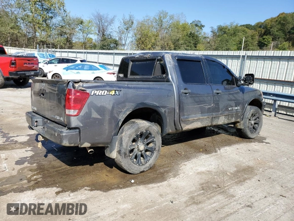 2015 Nissan Titan SL with VIN 1N6BA0EC5FN509230, listed as a Copart auction lot 73983574 with 144,288 mi miles and Salvage Title. Bid and sale history available at carsss.com. Image 3.