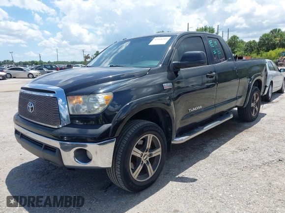 2012 Toyota Tundra z VIN 5TFRY5F17CX128888, wystawiony jako IAAI lot #42508395 z przebiegiem 279 524 mil mil oraz . Historia ofert i sprzedaży dostępna na DreamBid. Obrazek 17.