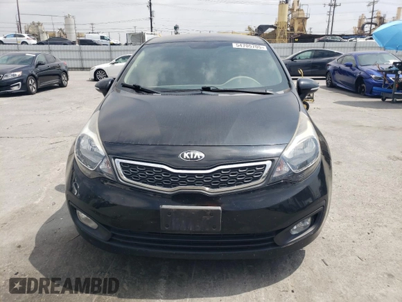 2014 Kia Rio EX z VIN KNADN4A3XE6377570, wystawiony jako Copart lot #54705705 z przebiegiem 63 982 mil mil oraz Tytuł czysty. Historia ofert i sprzedaży dostępna na DreamBid. Obrazek 5.