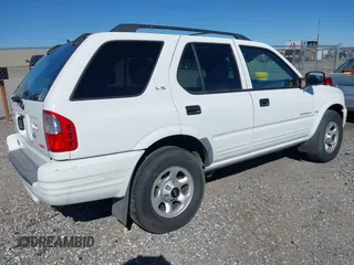 2001 Isuzu Rodeo S z VIN 4S2DM58W214347968, wystawiony jako IAAI lot #41871597 z przebiegiem 216 343 mil mil oraz . Historia ofert i sprzedaży dostępna na DreamBid. Obrazek 4.