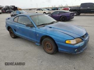 1995 Ford Mustang with VIN 1FALP4045SF145706, listed as a Copart auction lot 69829614 with 164,460 mi miles and Salvage Title. Bid and sale history available at carsss.com. Image 4.