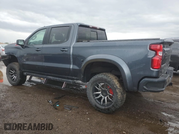 2021 Chevrolet Silverado 1500 RST with VIN 1GCUYEEL8MZ219882, listed as a Copart auction lot 55913795 with 124,373 mi miles and Salvage Title. Bid and sale history available at DreamBid. Image 2.
