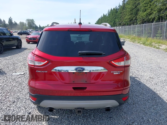 2015 Ford Escape Titanium with VIN 1FMCU9J93FUB28037, listed as a IAAI auction lot 42432345 with 133,242 mi miles and . Bid and sale history available at DreamBid. Image 16.