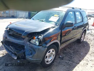 2006 Honda CR-V LX with VIN JHLRD68586C009537, listed as a IAAI auction lot 42029852 with 160,311 mi miles and . Bid and sale history available at DreamBid. Image 17.