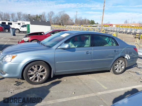 2009 Toyota Avalon XL with VIN 4T1BK36B19U350297, listed as a IAAI auction lot 41589714 with 141,003 mi miles. Bid and sale history available at carsss.com. Image 14.