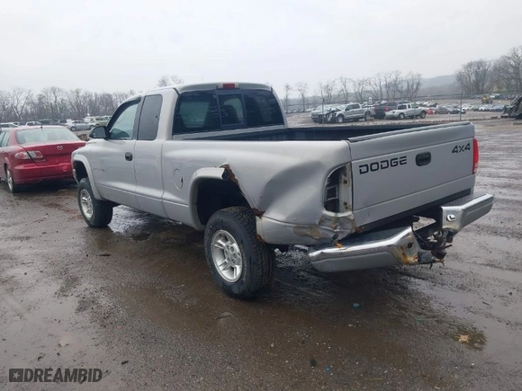 2000 Dodge Dakota Sport with VIN 1B7GG22N9YS515836, listed as a IAAI auction lot 42009948 with 128,982 mi miles. Bid and sale history available at carsss.com. Image 3.