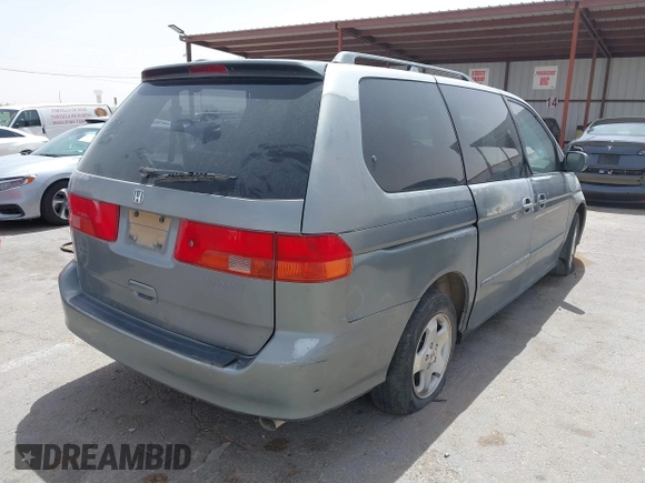 2000 Honda Odyssey EX with VIN 2HKRL1865YH569356, listed as a IAAI auction lot 42257861 with Not provided miles and . Bid and sale history available at DreamBid. Image 4.