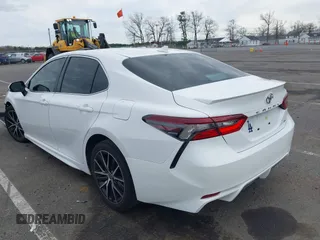 2023 Toyota Camry SE with VIN 4T1T11AK7PU722290, listed as a IAAI auction lot 41954940 with 29,825 mi miles and . Bid and sale history available at DreamBid. Image 3.