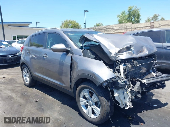 2012 Kia Sportage LX with VIN KNDPB3A2XC7273890, listed as a IAAI auction lot 39784243 with 146,067 mi miles. Bid and sale history available at carsss.com. Image 1.
